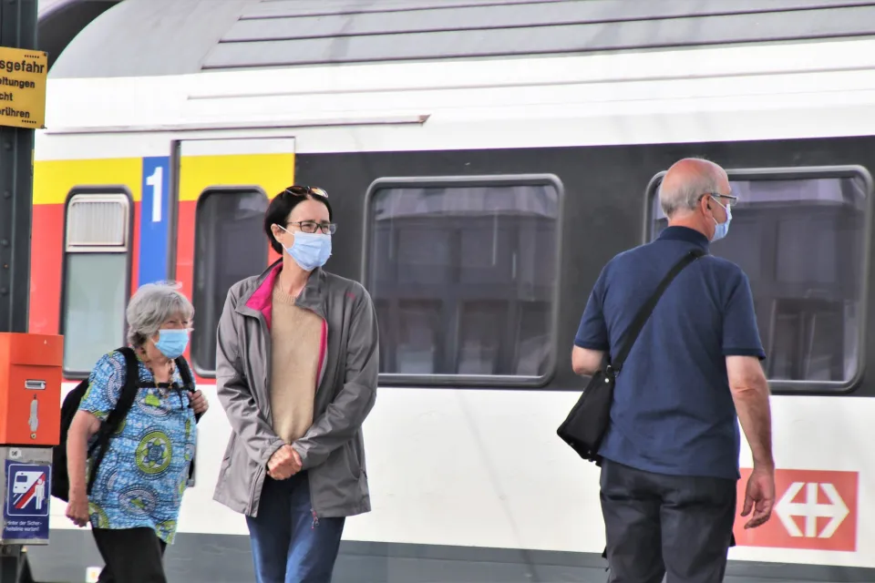 Masked Passengers at Rainway Station